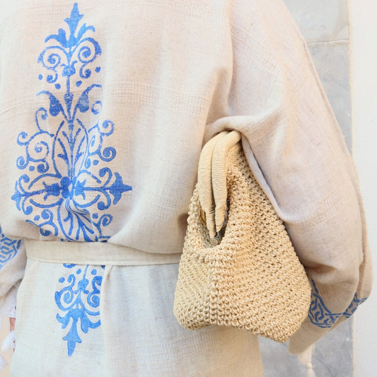 luxury raffia clutch bag